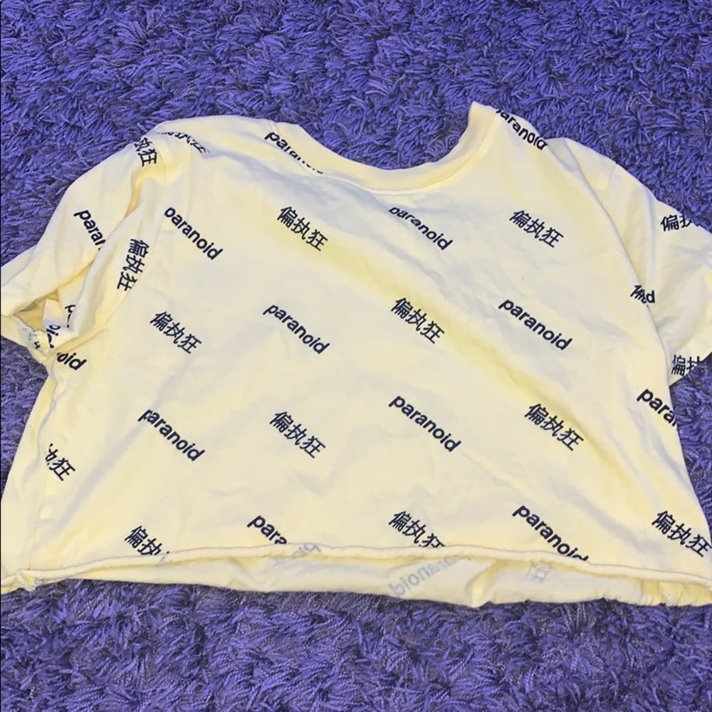 yellow shirt with paranoid and Chinese print